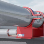 A RedLineIPS weldless pipe shoe securely holds a pipe in place with bolted clamps, providing a robust and corrosion-resistant support solution.