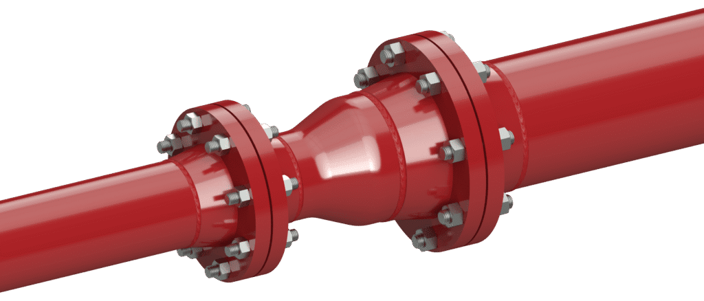 Concentric reducer installed in industrial red piping system with flanged connections