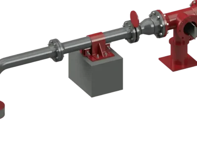 Pipe with RedLineIPS Hold Down Clamp Industrial piping assembly with red hold down clamp and shim block pipe support on a concrete pedestal, connected to a flanged valve and vertical outlet.